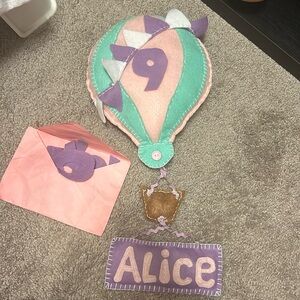 Felt Balloon Monthly Milestone prop “Alice”.